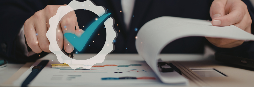 Business professional approving documents with a checkmark stamp representing compliance, verification, and automated workflow validation.